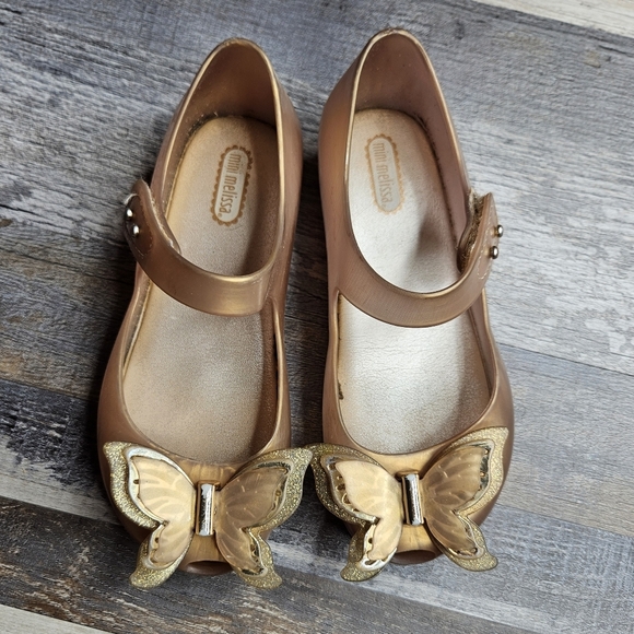 Mini Melissa Shoes Gold Mary Jane Style Butteefly Toes Size 11 Toddler - Picture 1 of 8